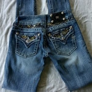 Miss Me skinny jeans waist is 25 and inseam is 30
